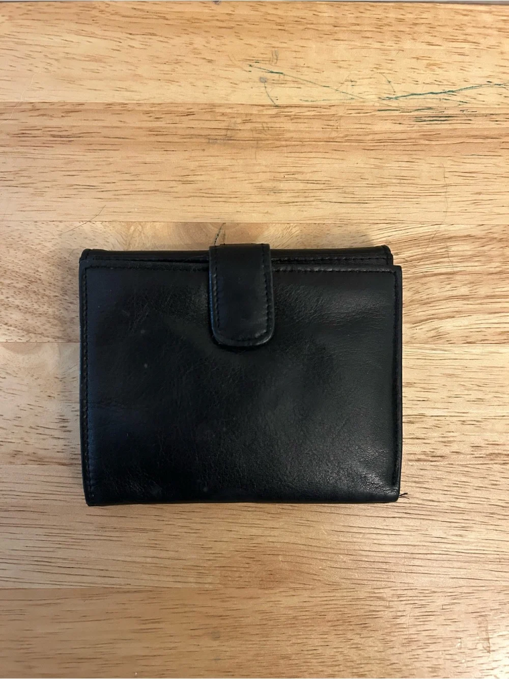 Vintage smooth black leather bifold wallet from Talbot